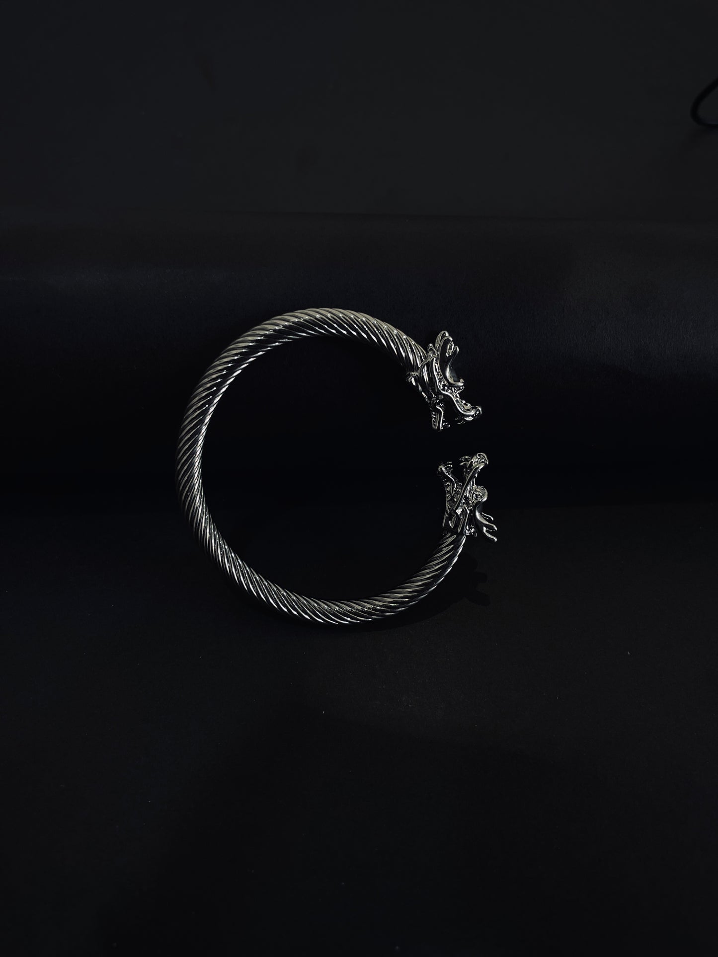 Dual Tone Steel Cable Cuff Bracelet with Gold Lion Heads