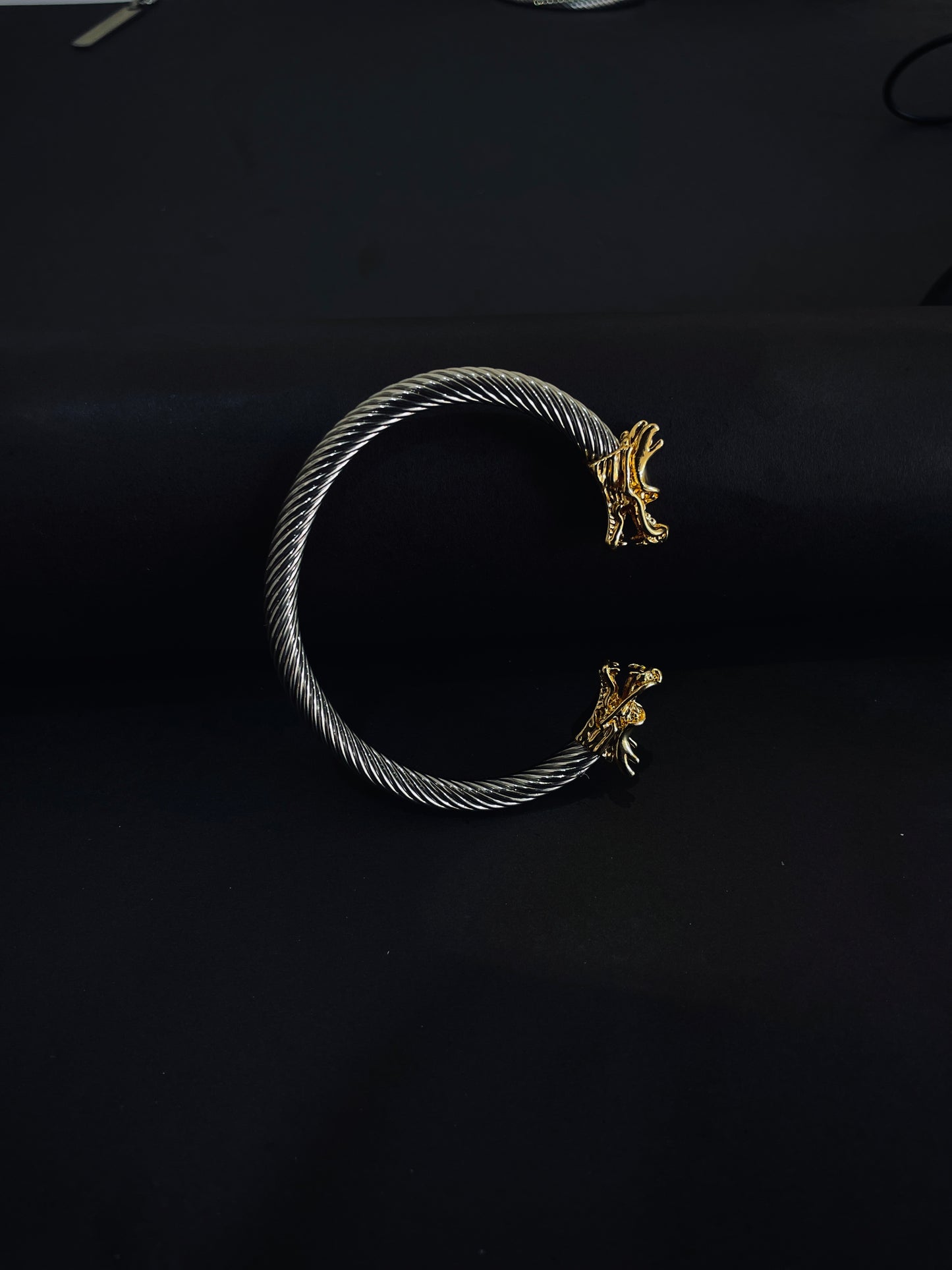 Dual Tone Steel Cable Cuff Bracelet with Gold Lion Heads